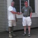 Hauser Contractors and client shaking hands